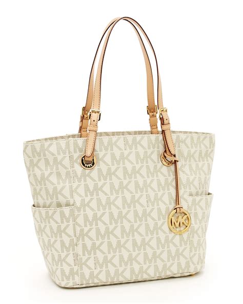 michael kors jet set logo large tote vanilla|Michael Kors jet set saffiano.